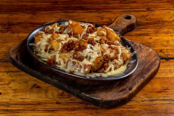 Imagem do item Batata Rústica com Farofa de bacon e queijo